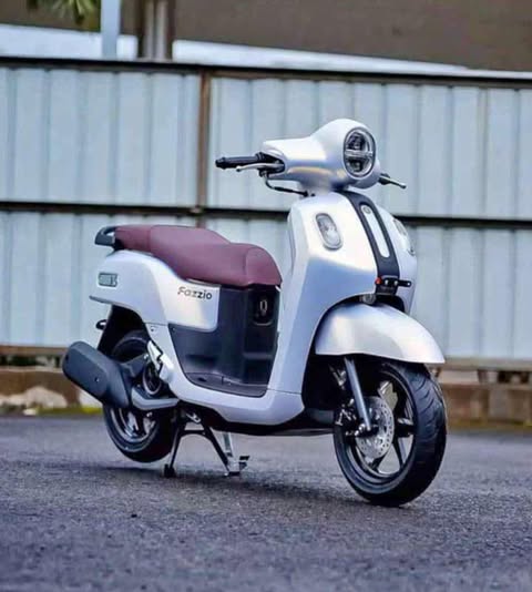 Red sport motorcycle model X1 with aerodynamic design and shiny chrome details