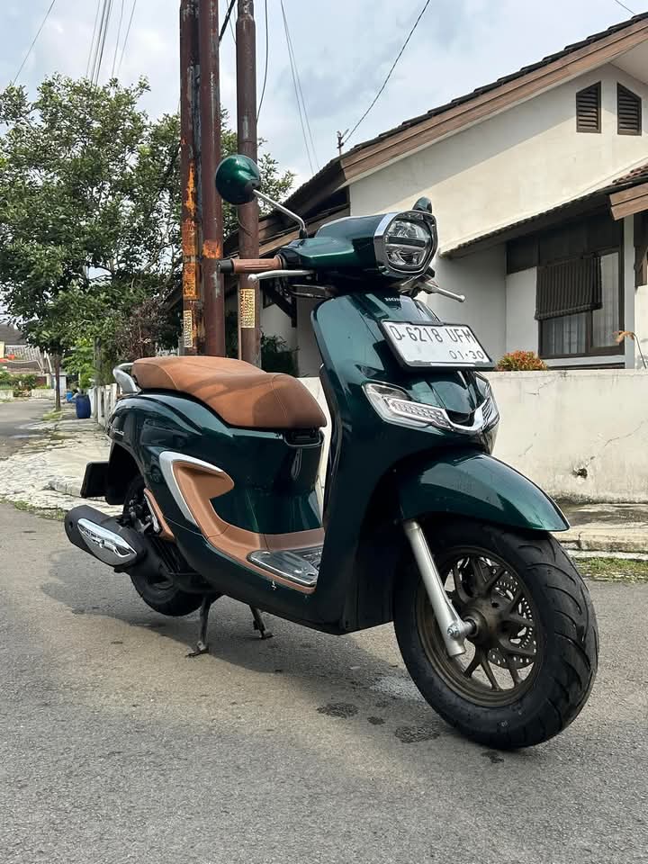 Green sport motorcycle model S9 with aggressive styling and high-performance engine